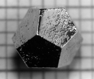 A Ho-Mg-Zn quasicrystal over a millimeter grid